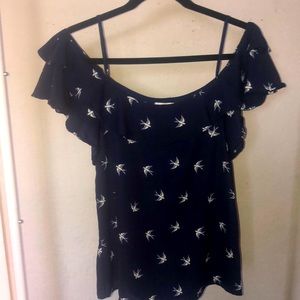 Navy blue blouse with white birds